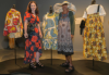 Carlyndal Slight di Tullio (QUT Student Designer) and Daisy Hamlot (Hopevale Fabric Designer) with garments designed as part of the couture collaboration on display at artisan (Bowen Hills).jpg